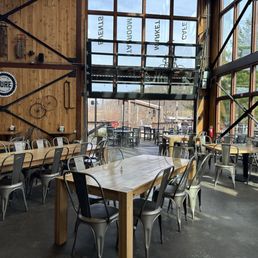 Inside restaurant area with the garage doors up on a warm March day Inside restaurant area with the garage doors up on a warm March day