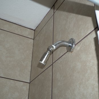 Mountain Trail Lodge - Crusty shower head. Not even a proper shower head. just a pipe - Vacation Rentals Near Me - Oakhurst, California Mountain Trail Lodge - Crusty shower head. Not even a proper shower head. just a pipe - Vacation Rentals Near Me - Oakhurst, California