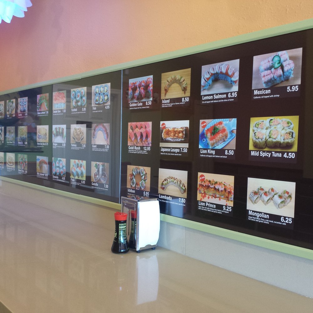 Yo Sushi - Here's the wall with sushi pictures and prices. - Sushi Bars Near Me - Albany, California Yo Sushi - Here's the wall with sushi pictures and prices. - Sushi Bars Near Me - Albany, California