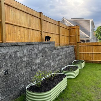 AA & B Landscaping - Retaining wall between upper street and lower backyard - Landscaping Near Me
