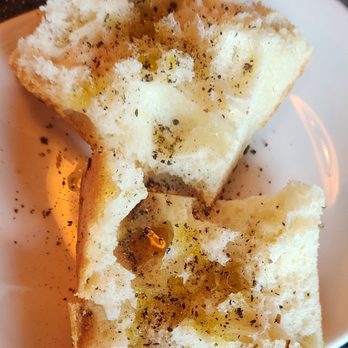 Bricco Trattoria - Focaccia with oil and ground black pepper - Italian Near Me - Glastonbury, Connecticut Bricco Trattoria - Focaccia with oil and ground black pepper - Italian Near Me - Glastonbury, Connecticut