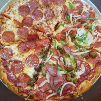Mancino's - Half and half Pizza makes a happy teenager - Pizza Near Me - Grand Haven, Michigan Mancino's - Half and half Pizza makes a happy teenager - Pizza Near Me - Grand Haven, Michigan