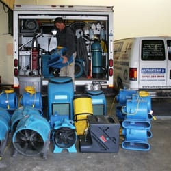Ultrasteam Professional Cleaning & Restoration Services - Getting ready to dry a flooded house with an IICRC Certified Water Damage specialist at UltraSteam!