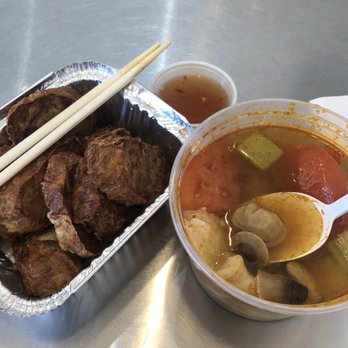 Saiguette - Left: Crispy tofu skin roll; Right: Canh chua with shrimp and fish - Vietnamese Near Me - Manhattan, New York Saiguette - Left: Crispy tofu skin roll; Right: Canh chua with shrimp and fish - Vietnamese Near Me - Manhattan, New York