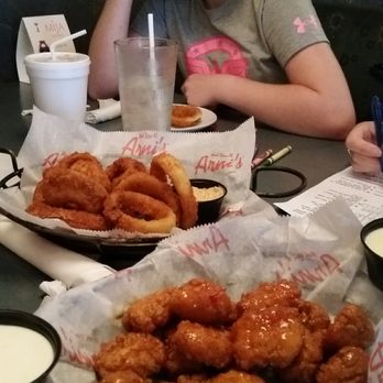 Arni's - Appetizers! Tail chili boneless wings and onion rings. - Pizza Near Me - Indianapolis, Indiana Arni's - Appetizers! Tail chili boneless wings and onion rings. - Pizza Near Me - Indianapolis, Indiana