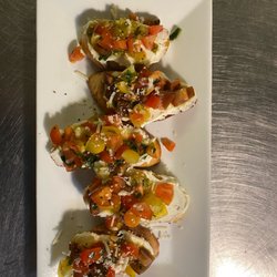 Mezzo Italiano - Our Bruschetta made with heirloom cherry tomatoes.