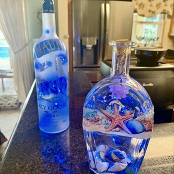 Conca D'oro - LED lighted liquor bottles with a nautical flare....$15.00. Created by Lady Di of Lady Di's Classy Crafts & Boutique - Pizza Near Me - Forked River, New Jersey
