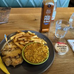 Nando's - Medium Chicken Butterfly, with Peri Chips. Spicy Rice and Perinaise (2024) £16