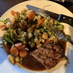 This is the steak and vegetables. Swimming it what I was told is au jus. No where on the menu does it mention the au jus. This is the steak and vegetables. Swimming it what I was told is au jus. No where on the menu does it mention the au jus.