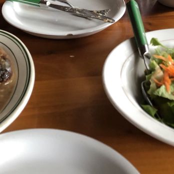 Le Petit Cafe - Meat and salad. Sausage and lamb on beans. - French Near Me - Bloomington, Indiana