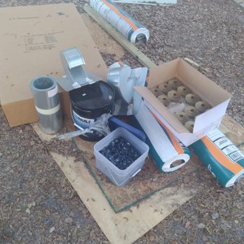 Total Home Roofing - some of the material they left after the job was done and charged me for the big box is a clay roof vent we have metal roof. - Roofing Near Me - Rockledge, Florida