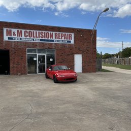 Exterior outside entrance of M & M Collision Repair - Pflugerville, Texas Exterior outside entrance of M & M Collision Repair - Pflugerville, Texas