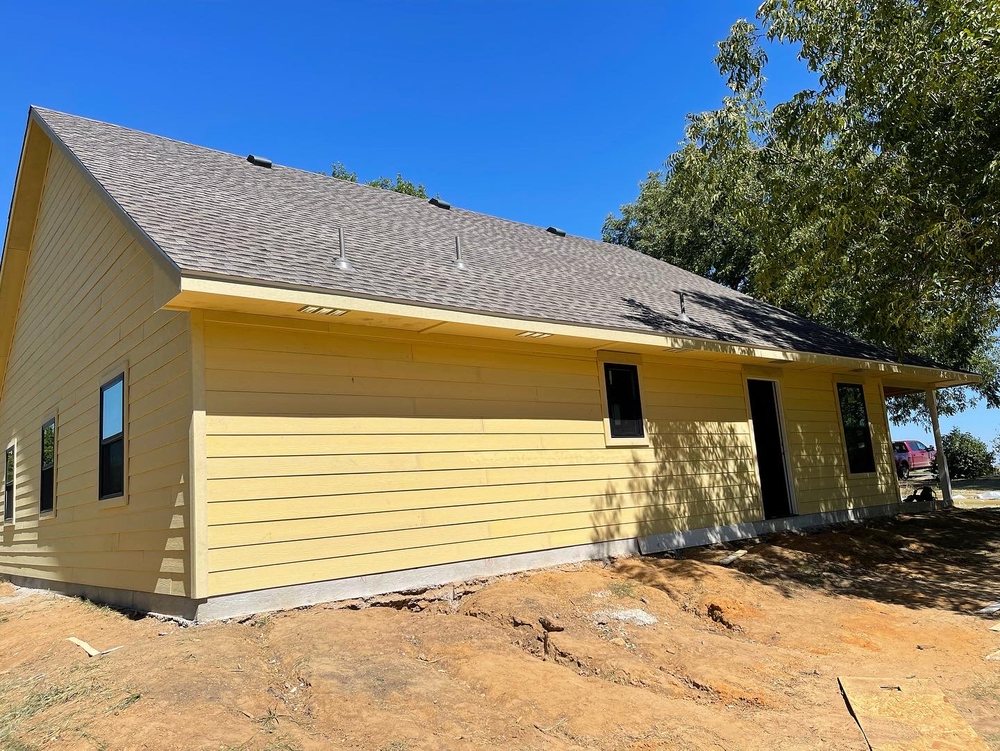 Slide of Wilson Roofing