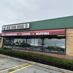 New York Bagel - Storefront from parking lot.