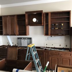 Phelps Construction - Installing new cabinets