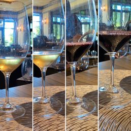 three glasses of wine on a table three glasses of wine on a table