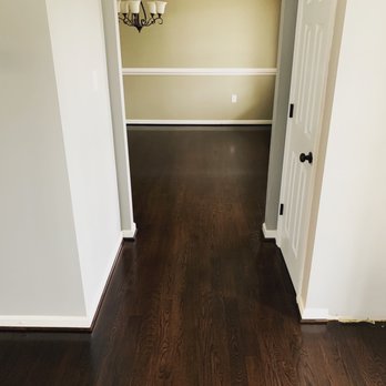 Mike's Custom Flooring - a hallway leading to a dining room - Flooring Near Me Mike's Custom Flooring - a hallway leading to a dining room - Flooring Near Me
