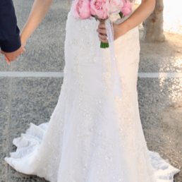 This rental wedding dress fitted well on me w/o alterations. I am petite, around 5 feet 1.5 inches tall, and around 105 pounds. This rental wedding dress fitted well on me w/o alterations. I am petite, around 5 feet 1.5 inches tall, and around 105 pounds.