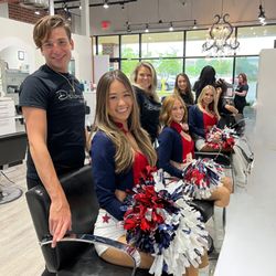 Dellaria Salons - Dellaria Salon Stylists getting Patriots Cheerleaders game day ready by providing them with gorgeous hair!