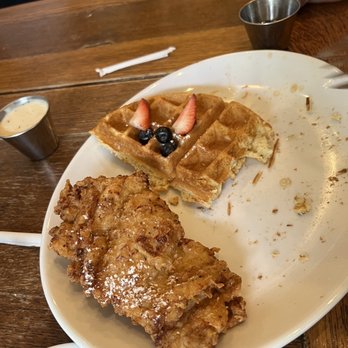 Oddfellows - Fried Chicken and Waffle half eaten! - Breakfast & Brunch Near Me - Dallas, Texas Oddfellows - Fried Chicken and Waffle half eaten! - Breakfast & Brunch Near Me - Dallas, Texas