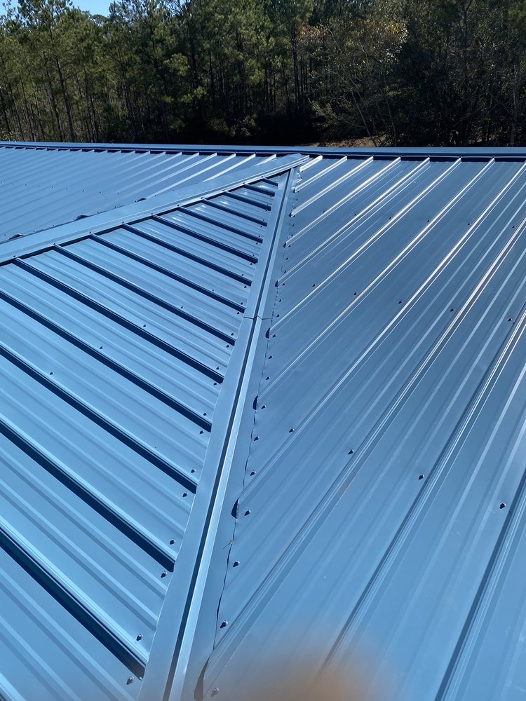 Slide of American Top Gun Roofing