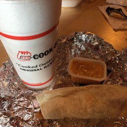 a burrito and a cup of coffee