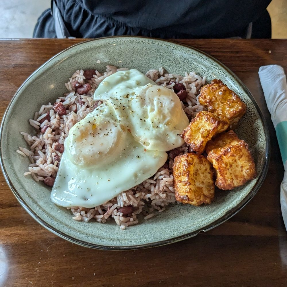 Guajiros Miami Eatery - Breakfast bowl: 2 eggs over rice and beans with a side of fried cheese - Coffee & Tea Near Me - Charlottesville, Virginia Guajiros Miami Eatery - Breakfast bowl: 2 eggs over rice and beans with a side of fried cheese - Coffee & Tea Near Me - Charlottesville, Virginia
