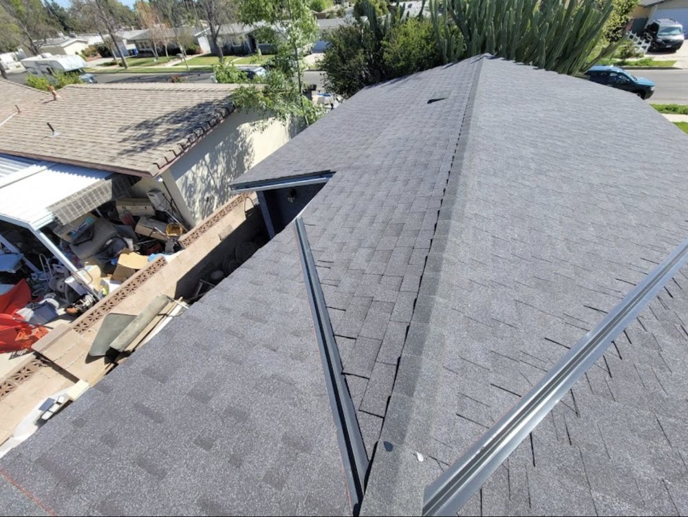 Slide of Grizzly Roofing