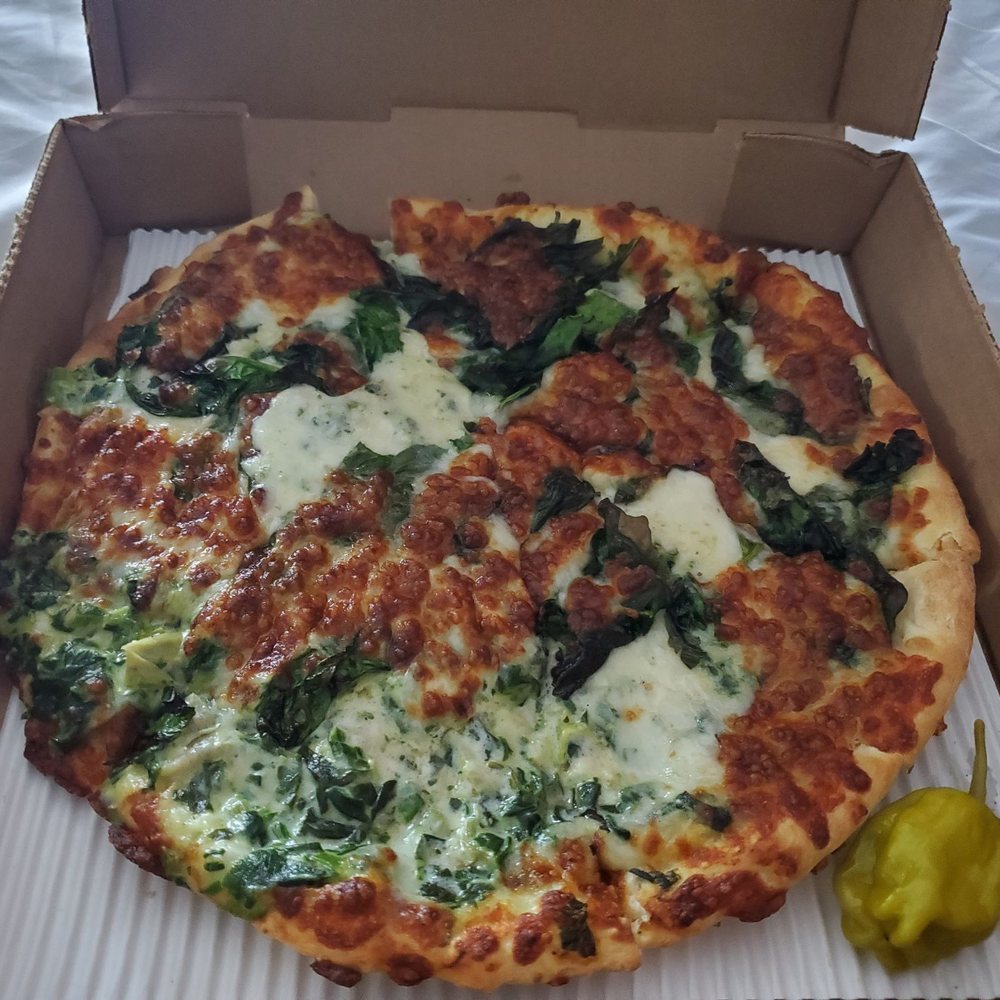 Rochetto's Pizzeria - Spinach Artichoke Pizza - Pizza Near Me - Scott, Louisiana Rochetto's Pizzeria - Spinach Artichoke Pizza - Pizza Near Me - Scott, Louisiana