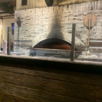 Brooksy's Brick Oven & Bar - a huge brick-oven in the center of the restaurant - Pizza Near Me - Andover, Massachusetts Brooksy's Brick Oven & Bar - a huge brick-oven in the center of the restaurant - Pizza Near Me - Andover, Massachusetts