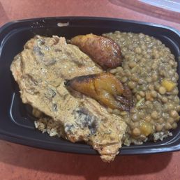 Coconut rice, lentils, chicken fricassee, and plantains Coconut rice, lentils, chicken fricassee, and plantains