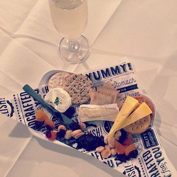 De Land House On Main - White Wine Cheese Plate. Fresh Goat cheese, Brie, and Gouda. - Modern European Near Me - Fairport, New York De Land House On Main - White Wine Cheese Plate. Fresh Goat cheese, Brie, and Gouda. - Modern European Near Me - Fairport, New York