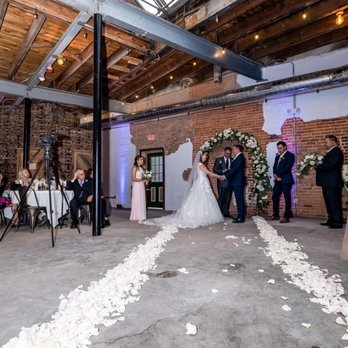 Thornton Distilling - a bride and groom walking down the aisle - Distilleries Near Me - Thornton, Illinois Thornton Distilling - a bride and groom walking down the aisle - Distilleries Near Me - Thornton, Illinois