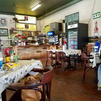 B J's Poorboy & Sandwich - a man sitting at a table - Sandwiches Near Me - Broussard, Louisiana B J's Poorboy & Sandwich - a man sitting at a table - Sandwiches Near Me - Broussard, Louisiana