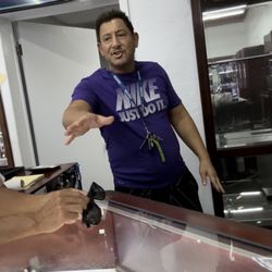 Laura’s Five Star Jewelry - Owner pointing and raising his voice