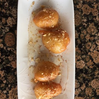 Chris' Taverna - This homemade loukoumades at Chris Taverna is a must staple dessert to finish your wonderful delicious meal @ Chris Taverna - Greek Near Me - Boynton Beach, Florida Chris' Taverna - This homemade loukoumades at Chris Taverna is a must staple dessert to finish your wonderful delicious meal @ Chris Taverna - Greek Near Me - Boynton Beach, Florida