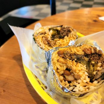 Poco Loco Tacos - two burritos on a yellow plate - Mexican Near Me - Cranston, Rhode Island