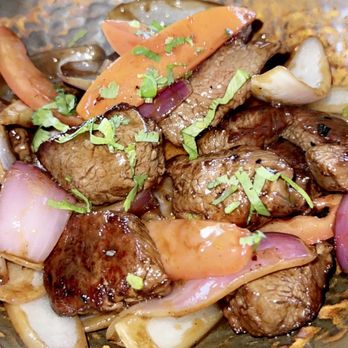 Pacha Nikkei - Lomo Saltado - Peruvian Near Me - Houston, Texas Pacha Nikkei - Lomo Saltado - Peruvian Near Me - Houston, Texas
