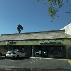 Right next to Domino's and Tax Services.