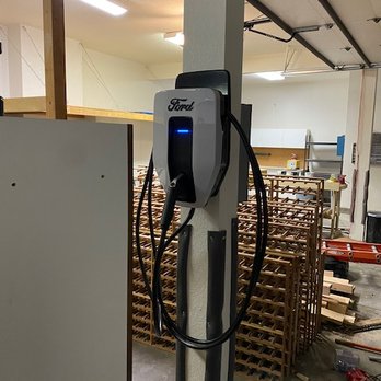 Elevation Electric - Ford Charge Station Pro Installation. Energy management equipment was used to save this customer money on expensive electrical upgrades - Electricians Near Me