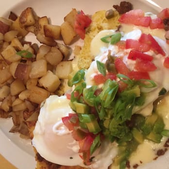 Wild Eggs - Katie's Border Benedict (poached eggs on top of corn cakes) - Breakfast & Brunch Near Me - Louisville, Kentucky Wild Eggs - Katie's Border Benedict (poached eggs on top of corn cakes) - Breakfast & Brunch Near Me - Louisville, Kentucky