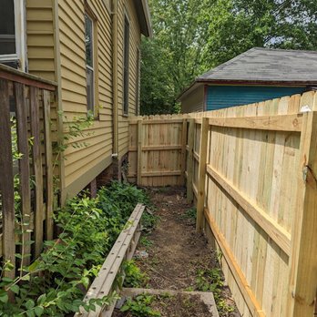 Crossbones Contracting - a garden with a wooden fence - General Contractors Near Me Crossbones Contracting - a garden with a wooden fence - General Contractors Near Me