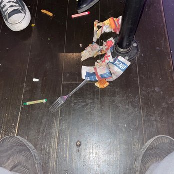 Bubba's 33 - The floor under the table when we were first seated. - Bars Near Me - Lubbock, Texas