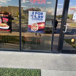 Hot Head Burritos - More signs showing 14.99 but they charge 15.99 and 1-3$ for every added ingredient.