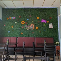 Crepes and Treats - What a cute floral accent wall!!