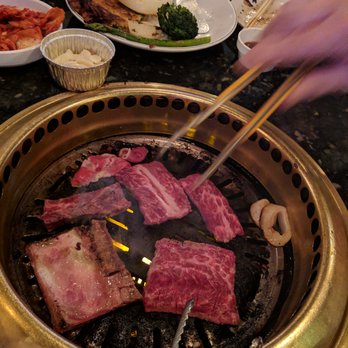 GOGI Korean BBQ - Grilling your own meat, gotta keep an eye on it! - Korean Near Me - Columbus, Ohio GOGI Korean BBQ - Grilling your own meat, gotta keep an eye on it! - Korean Near Me - Columbus, Ohio