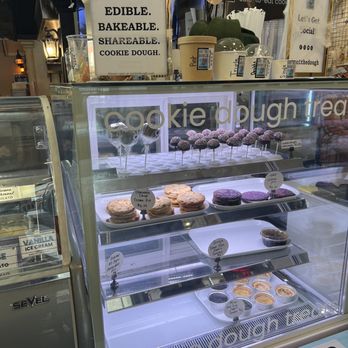 Out The Dough - a display case filled with donuts - Desserts Near Me - Martinez, California
