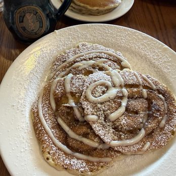 The Original Pancake House - Cinnamon Roll Pancakes: Fluffy pancakes infused with a rich cinnamon swirl and finished with a smooth, sweet glaze - Breakfast & Brunch Near Me - Fort Worth, Texas The Original Pancake House - Cinnamon Roll Pancakes: Fluffy pancakes infused with a rich cinnamon swirl and finished with a smooth, sweet glaze - Breakfast & Brunch Near Me - Fort Worth, Texas