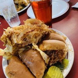 Aristocratic BBQ sandwich (Double) with onion rings, fries, and pickles. Aristocratic BBQ sandwich (Double) with onion rings, fries, and pickles.