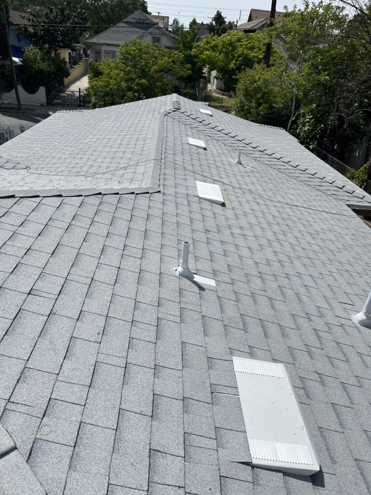 Slide of Goliath Roofing